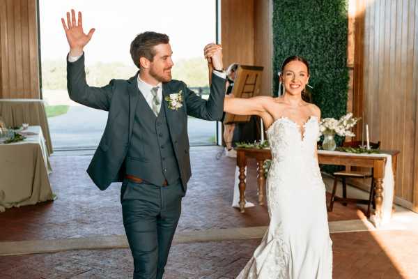 Bride and groom grand entrance at wedding reception